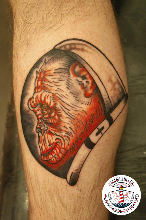 Monkey astronaut tattoo